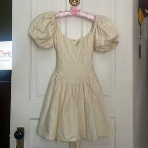 Virgin dress - cream colored - puff sleeves - great cleavage - so cool